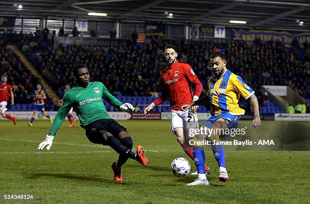 Reice Charles-Cook of Coventry City and Kyle Vassell of Shrewsbury Town during the Sky Bet League One match between Shrewsbury Town and Coventry City...