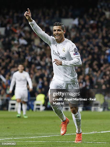 Cristiano Ronaldo of Real Madrid celebrates after scoring the opening goal during the UEFA Champions League Round of 16 Second Leg match between Real...