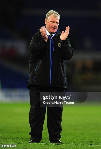 Steve Evans, Manager of Leeds United applaudes the travelling fans at the final whistle during the Sky Bet Championship match between Cardiff City...