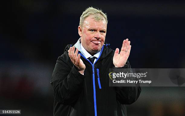 Steve Evans, Manager of Leeds United applaudes the travelling fans at the final whistle during the Sky Bet Championship match between Cardiff City...