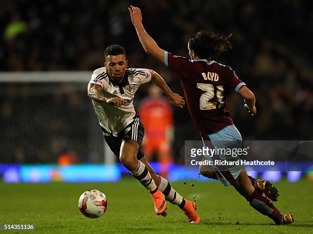 Ryan Fredericks of Fulham goes past George Boyd of Burnley during the Sky Bet Championship match between Fulham and Burnley at Craven Cottage on...