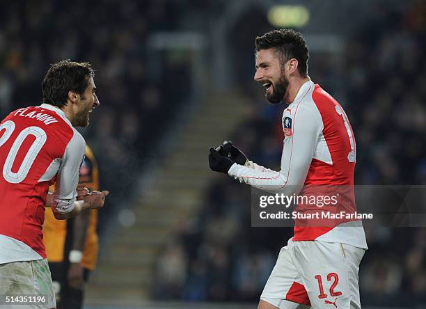 Olivier Giroud celebrates scoring the 2nd Arsenal goal with Mathieu Flamini during the Emirates FA Cup 5th Round replay between Hull City and Arsenal...