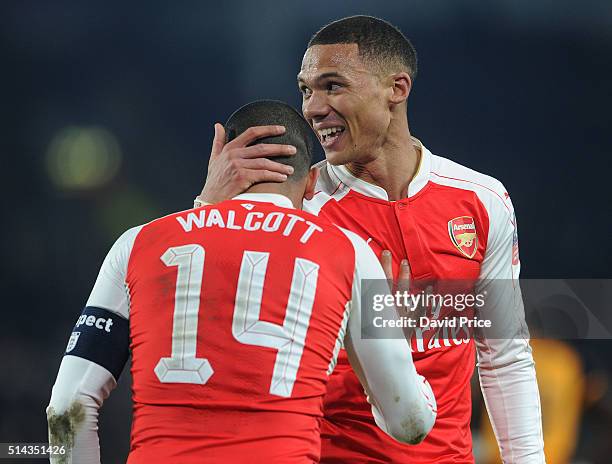 Kieran Gibbs and Theo Walcott of Arsenal during the match between Hull City and Arsenal in the FA Cup 5th round at KC Stadium on March 8, 2016 in...