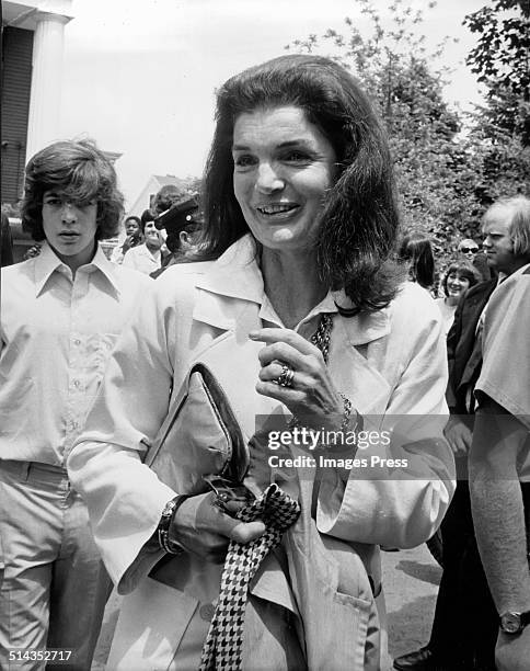 John F. Kennedy Jr and Jacqueline Kennedy Onassis attends Caroline Kennedys Graduation from Concord Academy on June 5, 1975 in Concord, Massachusetts.