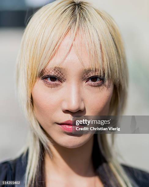 Portrait of model Soo Joo Park with eye make up outside Chanel during the Paris Fashion Week Womenswear Fall/Winter 2016/2017 on March 8, 2016 in...