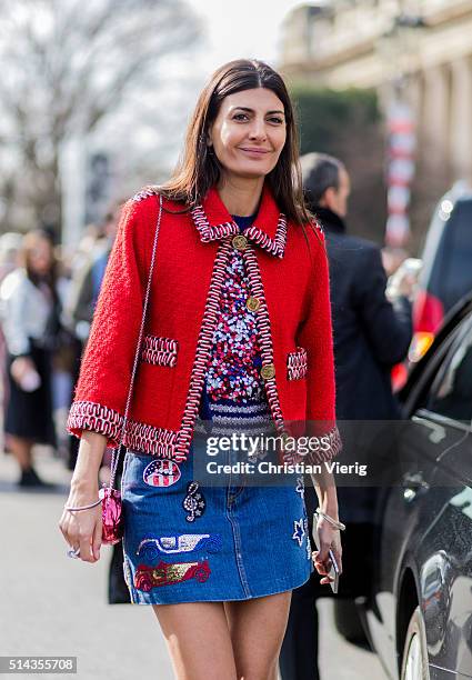 Giovanna Battaglia wearing a red Chanel blazer and denim skirt and outside Chanel during the Paris Fashion Week Womenswear Fall/Winter 2016/2017 on...