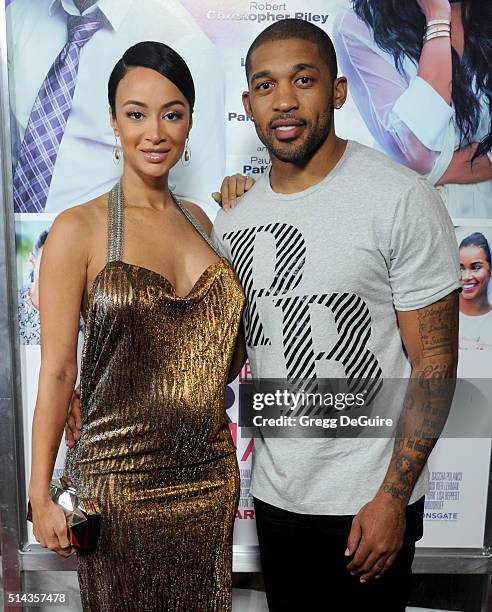 Draya Michele and Orlando Scandrick arrive at the premiere of Lionsgate's "The Perfect Match" at ArcLight Hollywood on March 7, 2016 in Hollywood,...