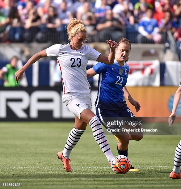 Kheira Hamraoui of France plays against Lindsey Horan of the USA in an international friendly match in the SheBelieves Cup at Nissan Stadium on March...