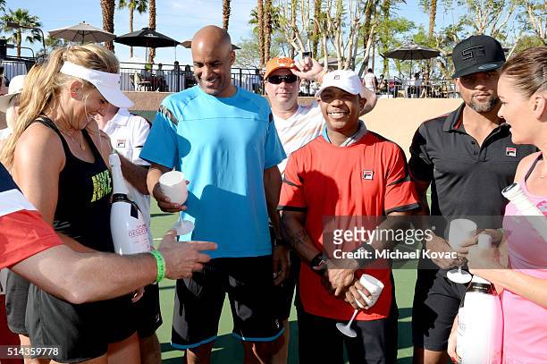 Tennis player Victoria Azarenka, actor Boris Kodjoe, rapper Ja Rule, fitness celebrity Shaun T. And tennis player Agnieszka Radwanska celebrate with...