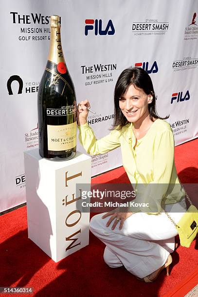 Actress Perrey Reeves celebrates with Moet & Chandon at the 12th annual Desert Smash at the Westin Mission Hills Golf Resort and Spa on March 8, 2016...
