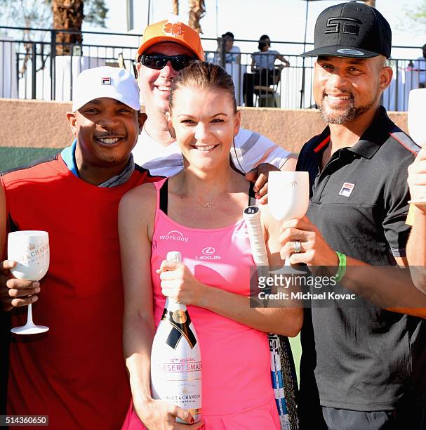 Rapper Ja Rule, tennis player Agnieszka Radwanska, and fitness celebrity Shaun T. Celebrate with Moet & Chandon at the 12th annual Desert Smash at...