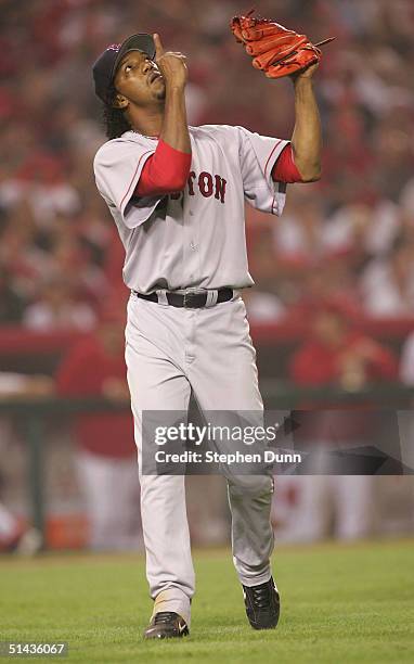 Pitcher Pedro Martinez of the Boston Red Sox celebrates after striking out Chone Figgins of the Anaheim Angels to end the seventh inning of the...