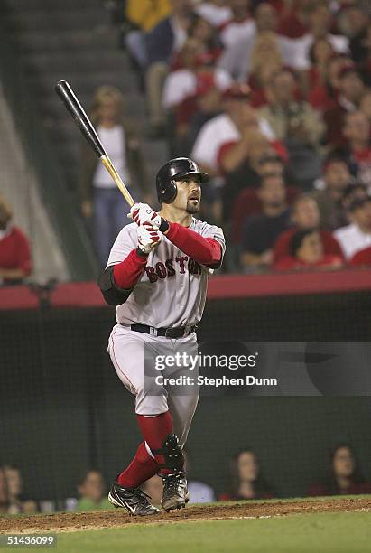 Jason Varitek of the Boston Red Sox hits the game-tying home run against the Anaheim Angels during sixth inning of the American League Division...