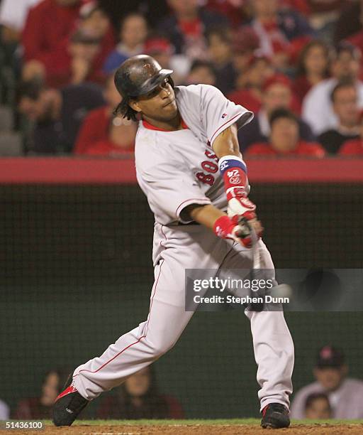 Manny Ramirez of the Boston Red Sox doubles in the ninth inning against the Anaheim Angels during sixth inning of the American League Division...