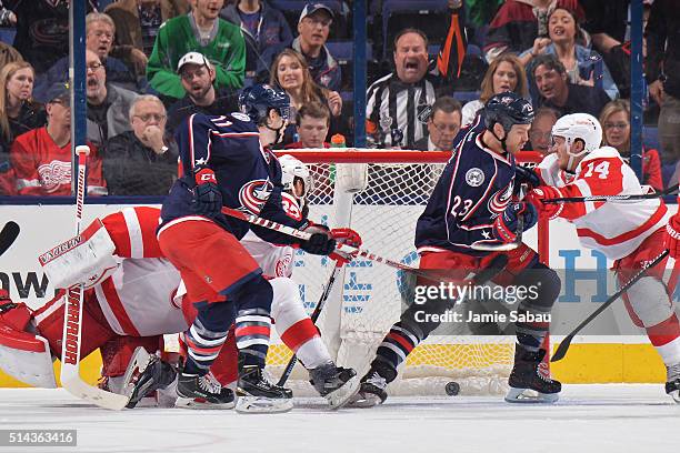 David Clarkson of the Columbus Blue Jackets scores on goaltender Jimmy Howard of the Detroit Red Wings during the second period of a game on March 8,...