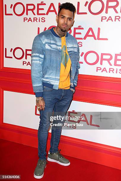 Chris Brown attends the L'Oreal Red Obsession Party - Photocall as part of the Paris Fashion Week Womenswear Fall/Winter 2016/2017 on March 8, 2016...