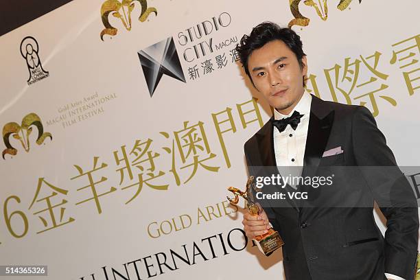 Actor Qin Hao attends the Gold Aries Award Of Macau International Film Festival on March 8, 2016 in Macau, China.