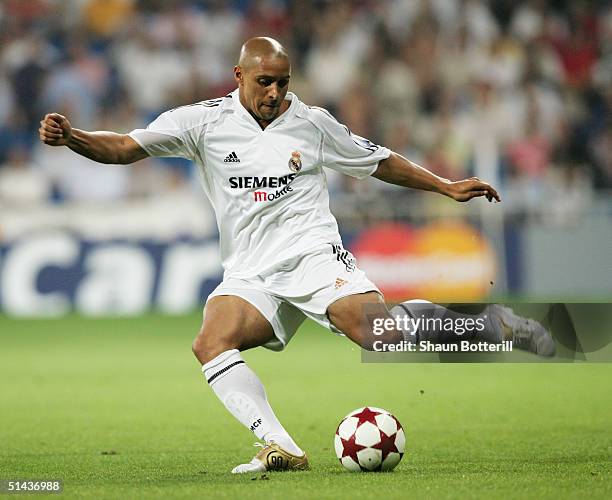 Roberto Carlos of Real Madrid in action during the UEFA Champions League Group B match between Real Madrid and Roma at the Santiago Bernabeu Stadium...