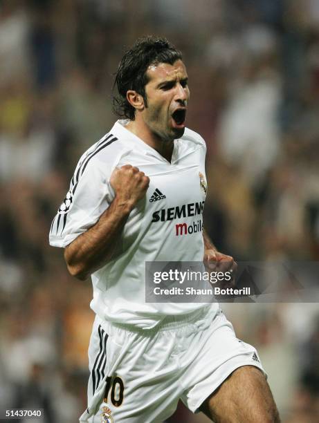 Luis Figo of Real Madrid celebrates during the UEFA Champions League Group B match between Real Madrid and Roma at the Santiago Bernabeu Stadium on...