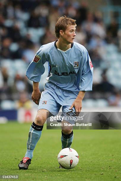 Matthew Mills of Coventry City runs with the ball during the Coca-Cola Football League match between Coventry City and Ipswich Town at Highfield Road...