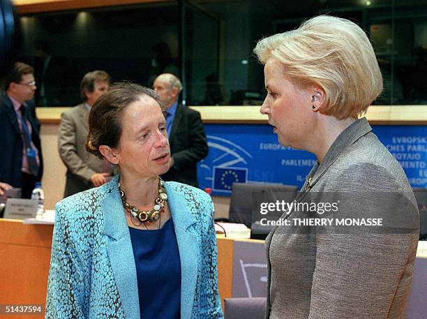 The Chairwoman of the Committee on Economic and Monetary Affairs, French socialist Pervenche Beres talks with the new incoming European commissioner...