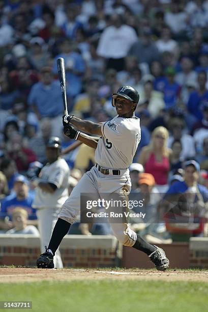 September 12: Outfielder Juan Pierre of the Florida Marlins takes a swing during the game against the Chicago Cubs at Wrigley Field on September 12,...