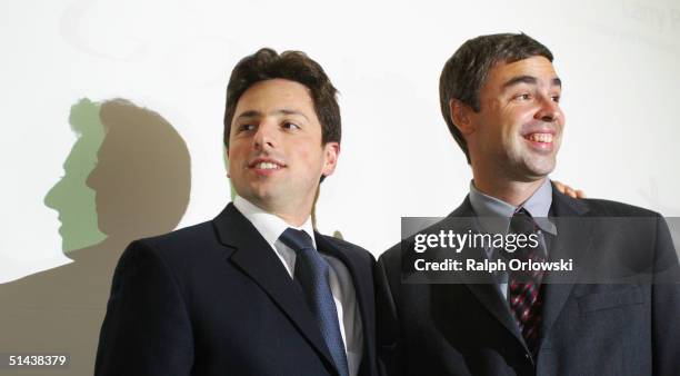 Google founders Sergey Brin and Larry Page smile prior to a news conference during the opening of the Frankfurt bookfair on October 7, 2004 in...