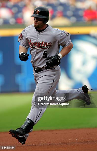 Jeff Bagwell of the Houston Astros rounds the bases after a solo homerun during the top of the first inning during game two of the National League...