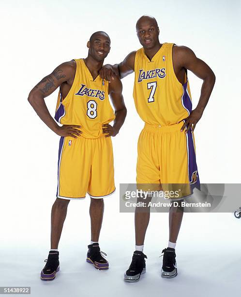 Kobe Bryant and Lamar Odom of the Los Angeles Lakers pose for a portrait during NBA Media Day on October 4, 2004 in Los Angeles, California. NOTE TO...