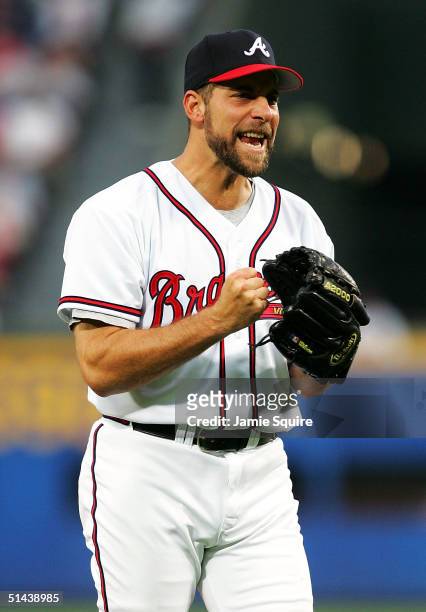 John Smoltz of the Atlanta Braves reacts after a strikeout against the Houston Astros during game two of the National League Divisional Series at...