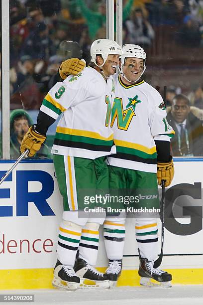 Minneapolis, MN Mike Modano and Andrew Brunette of the Minnesota North Stars/Wild celebrate after scoring a goal against the Chicago Blackhawks...
