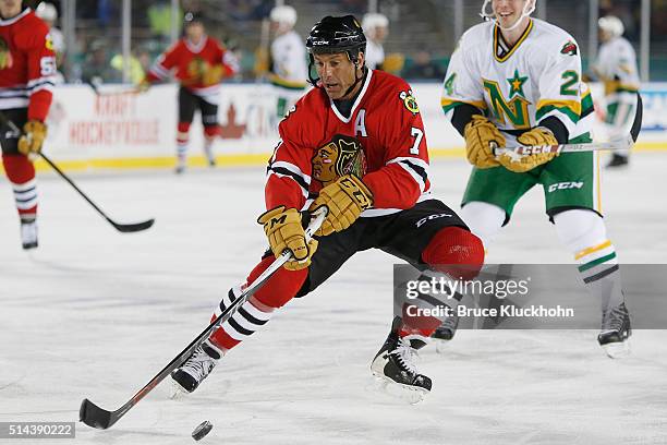 Minneapolis, MN Chris Chelios of the Chicago Blackhawks controls the puck against the Minnesota North Stars/Wild during the Coors Light NHL Stadium...