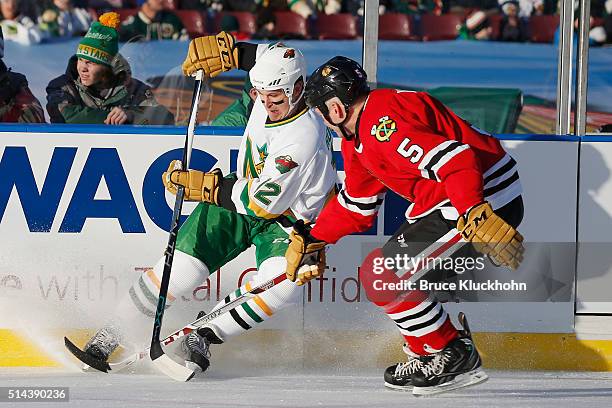 Minneapolis, MN Steve Konroyd of the Chicago Blackhawks defends Brian Rolston of the Minnesota North Stars/Wild during the Coors Light NHL Stadium...