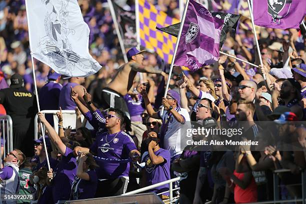 Orlando City fans cheer during a MLS soccer match between Real Salt Lake and the Orlando City SC at the Orlando Citrus Bowl on March 6, 2016 in...