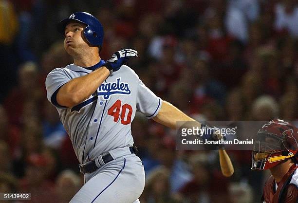 David Ross of the Los Angeles Dodgers hits a pop fly in Game 2 of the National League Division Series against the St. Louis Cardinals October 7, 2004...