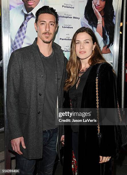 Actor Eric Balfour and wife Erin Chiamulon attend the premiere of "The Perfect Match" at ArcLight Hollywood on March 7, 2016 in Hollywood, California.