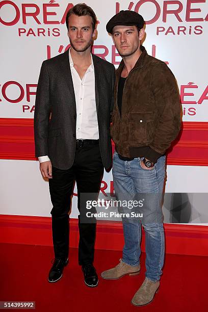 Guests attend the L'Oreal Red Obsession Party - Photocall as part of the Paris Fashion Week Womenswear Fall/Winter 2016/2017 on March 8, 2016 in...