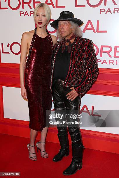 Soo Joo Park and James Goldstein attend the L'Oreal Red Obsession Party - Photocall as part of the Paris Fashion Week Womenswear Fall/Winter...