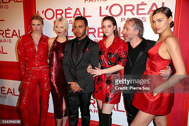 Lara Stone, Soo Joo Park, Lewis Hamilton, Barbara Palvin, Cyril Chapuy and Irina Shayk attend the L'Oreal Red Obsession Party - Photocall as part of...