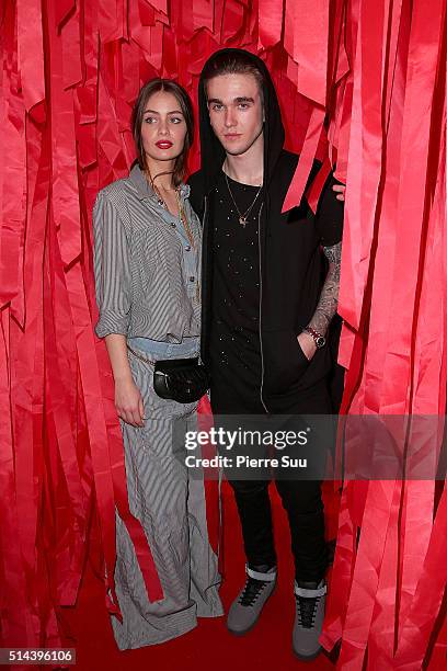 Marie Ange Casta and Gabriel Kane Day Lewis attend the L'Oreal Red Obsession Party - Photocall as part of the Paris Fashion Week Womenswear...