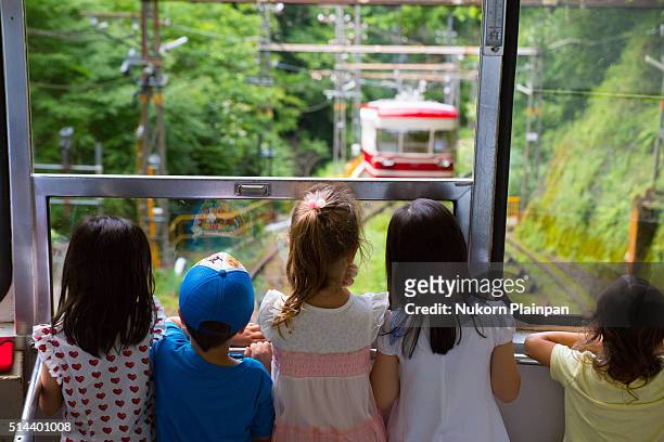 children and the tram - koya san stock pictures, royalty-free photos & images