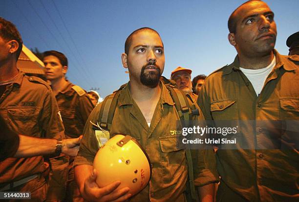 An Israeli army rescue team makes its way towards the Egyptian side of the border from the southern Israeli town of Eilat, on October 8, 2004 in...