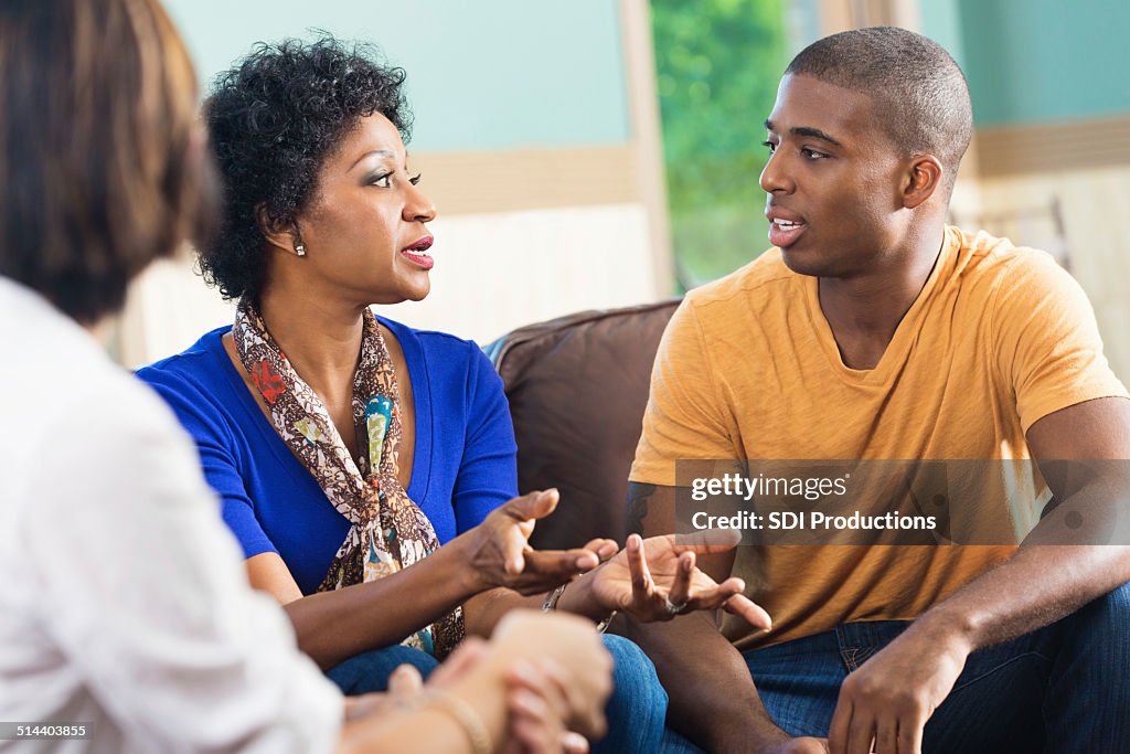 Couple discussing something during religious counseling session