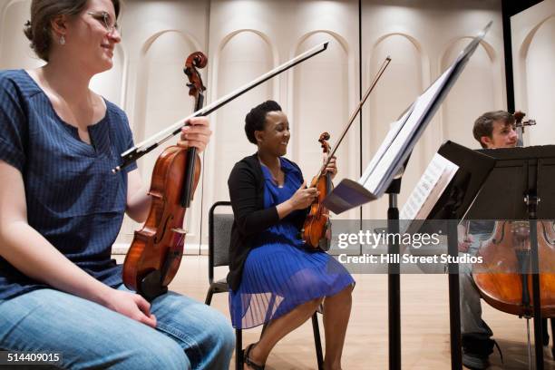 Leaners Playing String Instruments 1,244 College Student Playing Music Stock Photos, High-Res Pictures ...