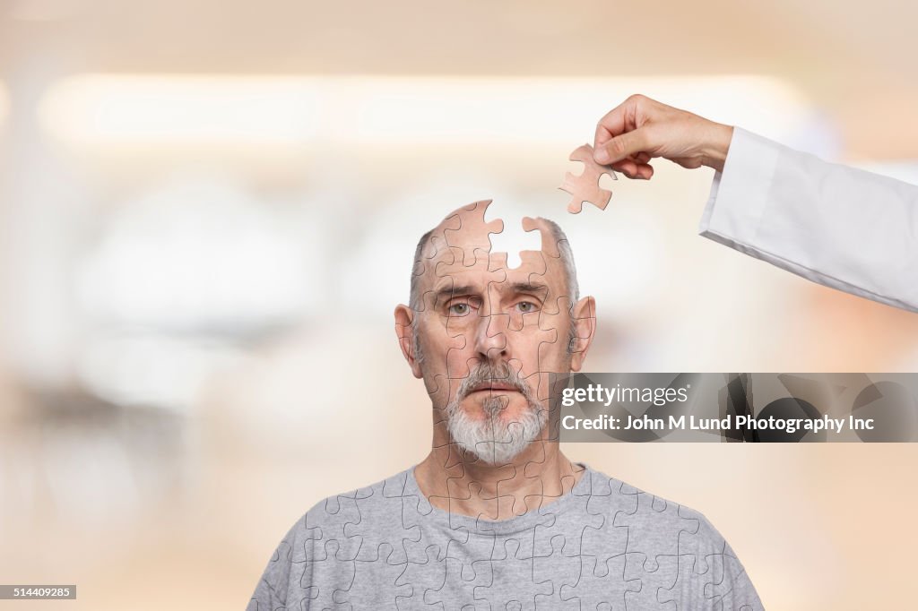 Doctor putting human puzzle together