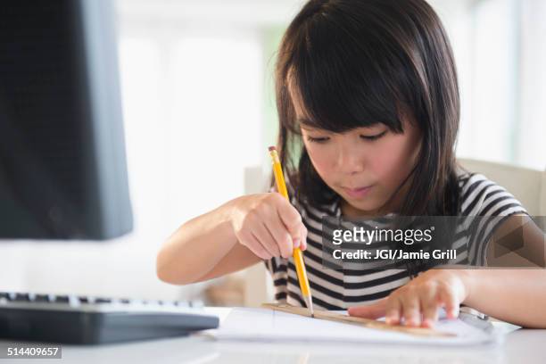 filipino girl drawing at computer - class rules stock pictures, royalty-free photos & images