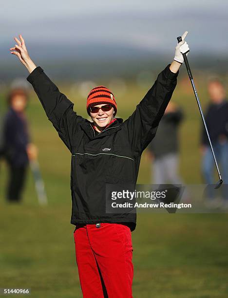 Jodie Kidd, the model, celebrates after holing her third shot for a birdie on the infamous 17th hole during the second round of of the Dunhill Links...