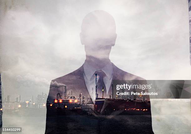 double exposure of businessman and power plant - control pants foto e immagini stock