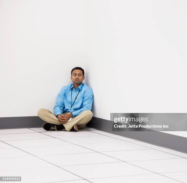 indian businessman sitting in office - real businessman isolated no smile stock pictures, royalty-free photos & images