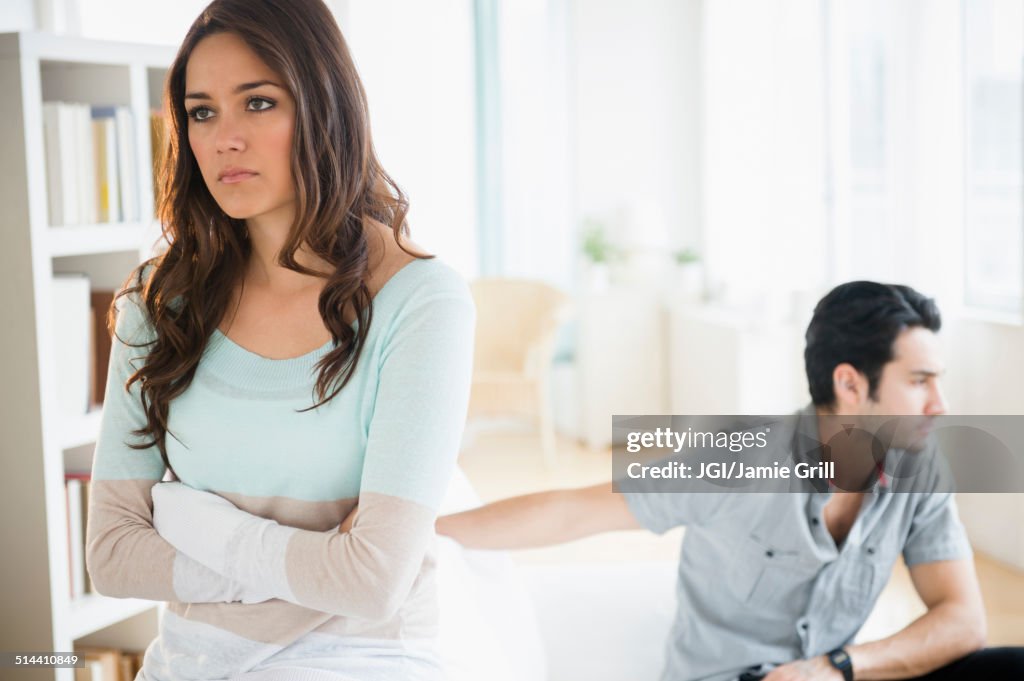 Couple arguing in living room